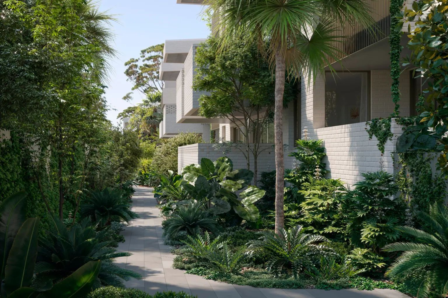 Garden path through a St Kilda East apartment and townhouse development